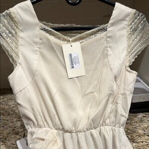 Joyfolie NWT Elegant Cream Sleeveless Dress, never worn all tags on